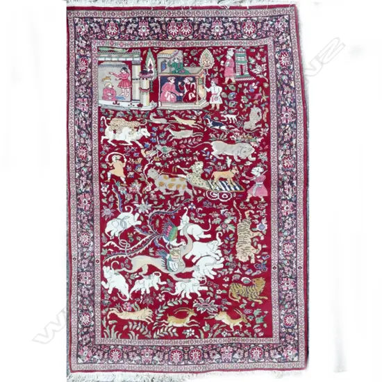 A hand knotted Persian pictorial rug