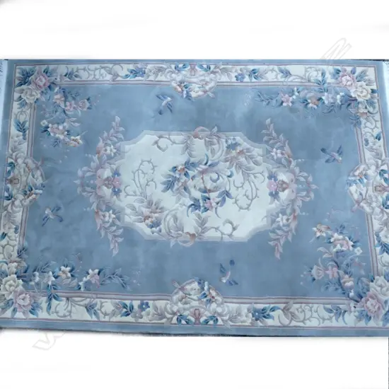 A large good quality handmade Chinese all wool rug