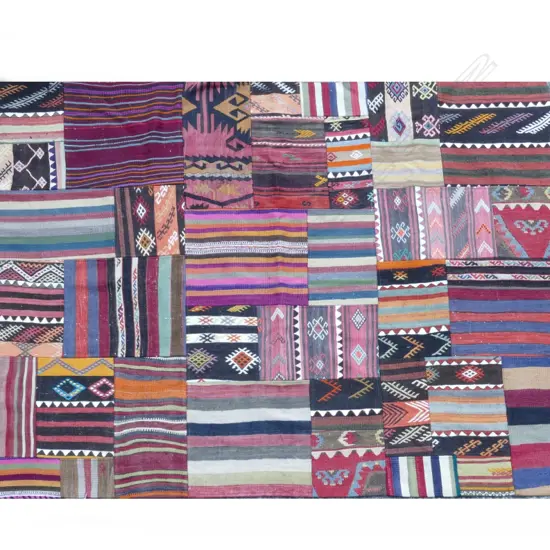 An unusual hand knotted Turkish patchwork kilim rug