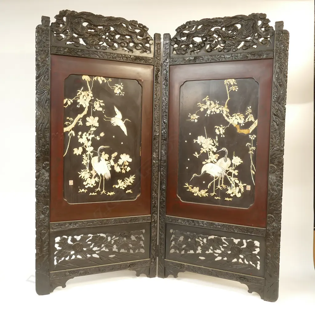 A large late 19thC Japanese ebonised two-fold screen Image 1++