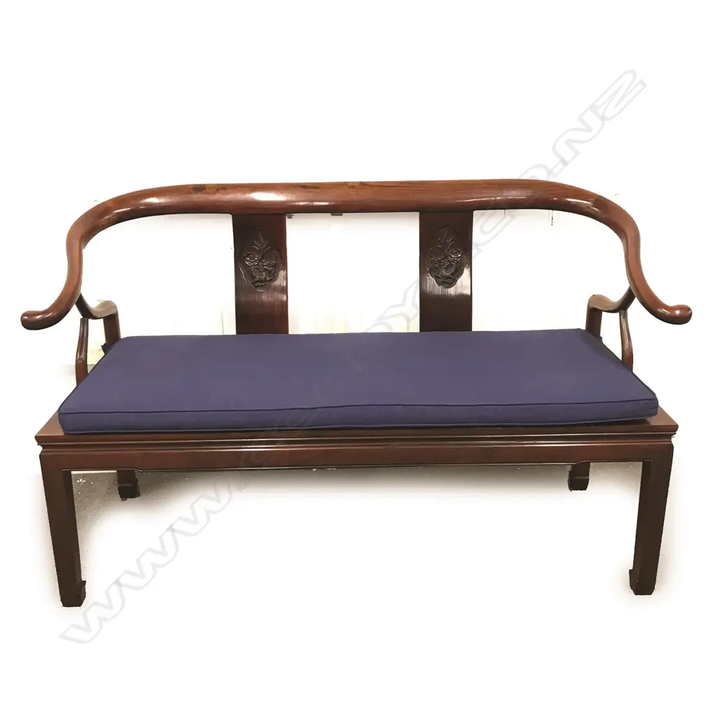 A Chinese rosewood yoke back two seater settle Image 1++