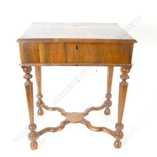 A small old walnut writing table of William and Mary style