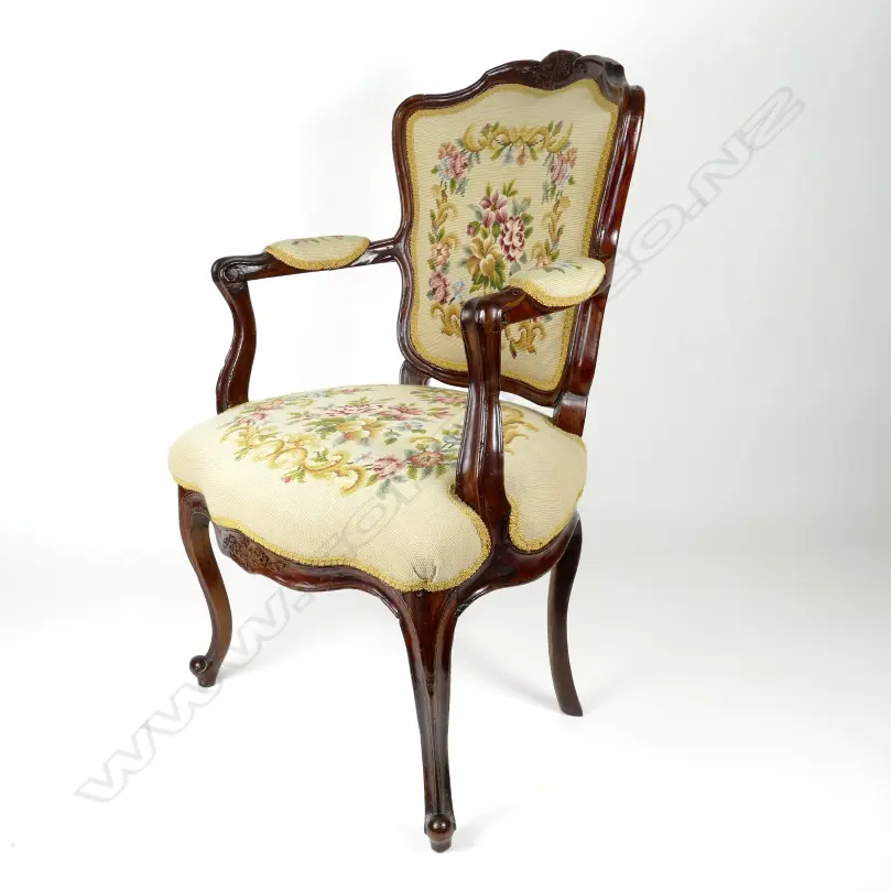 A 19thC French walnut open elbow chair of Louis XV style with cartouche back Image 1++