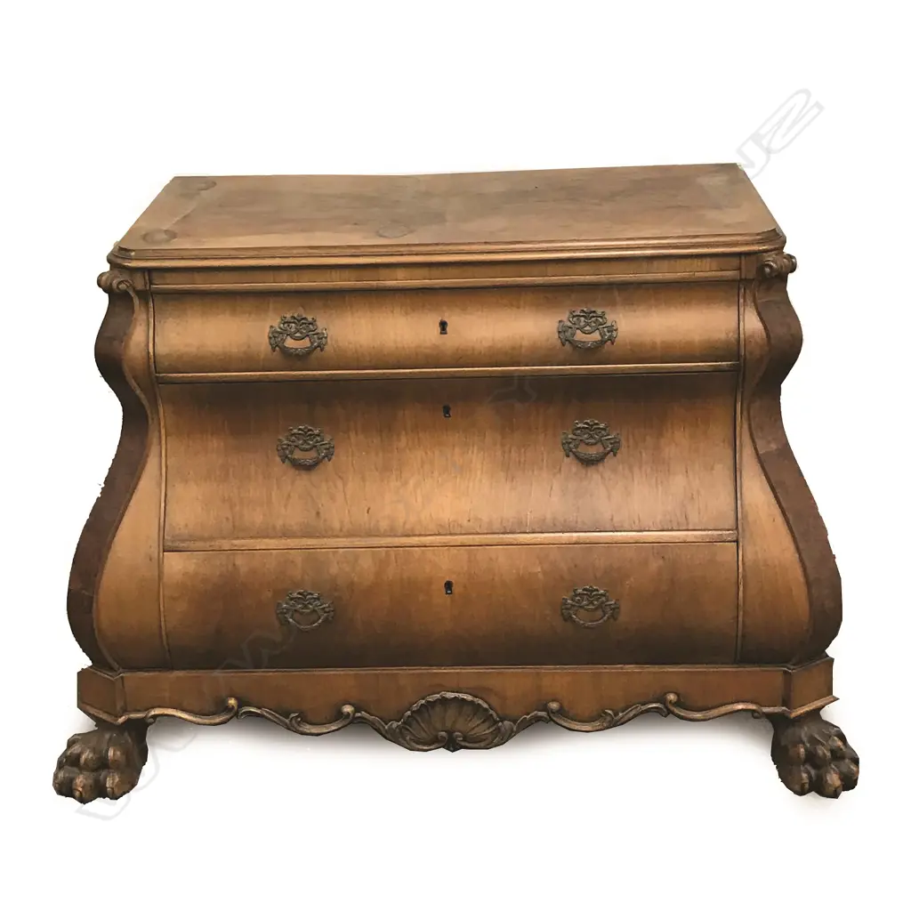 An early 20thC German walnut bombe commode Image 1++