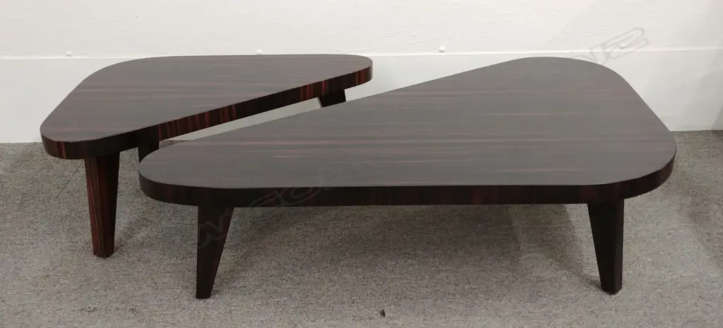 A contemporary two-piece ebony coffee table Image 1++
