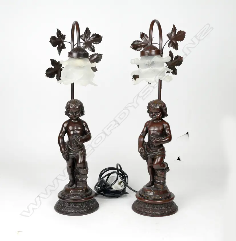 A pair of antique style bronzed table lamps Image 1++