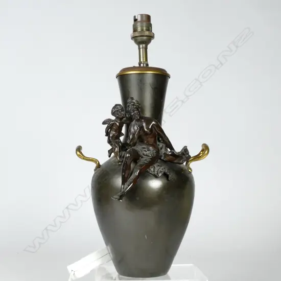 An Art Nouveau bronze table lamp