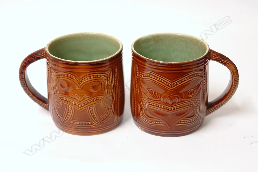 A pair of rare Crown Lynn Wharetana Maori Art Pottery 'Ruru and Weku' drinking mugs Image 1++