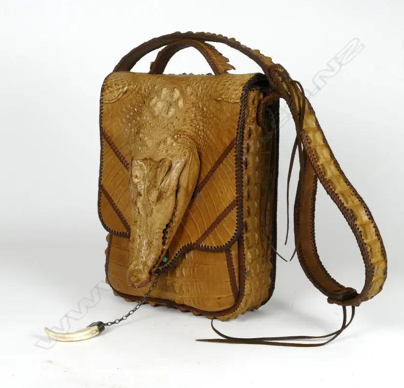 A large crocodile skin handbag Image 1++