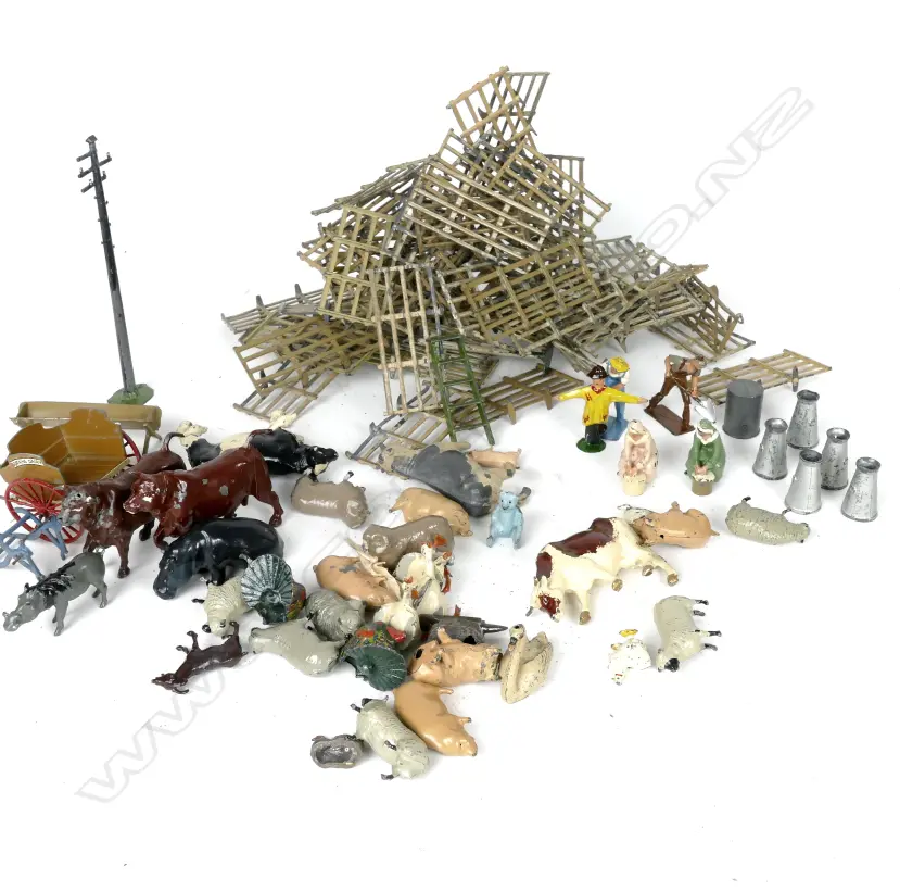 A selection of assorted vintage cast metal farm animals and people Image 1++