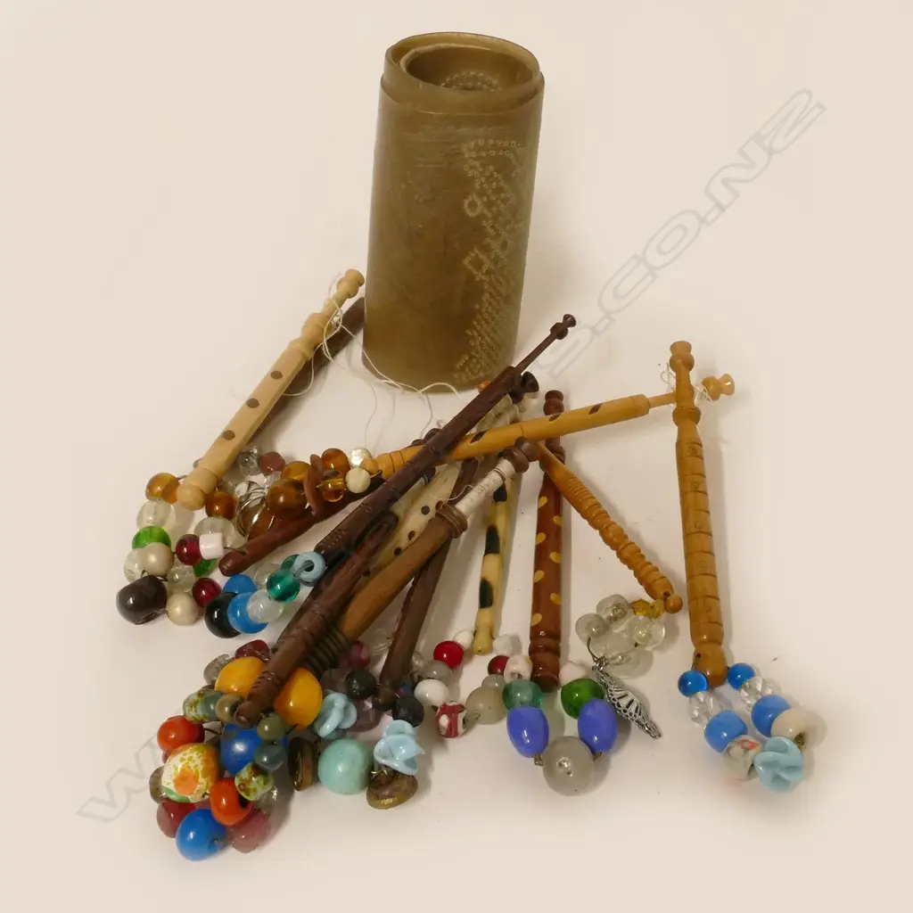 A collection of old beaded lace bobbins Image 1++