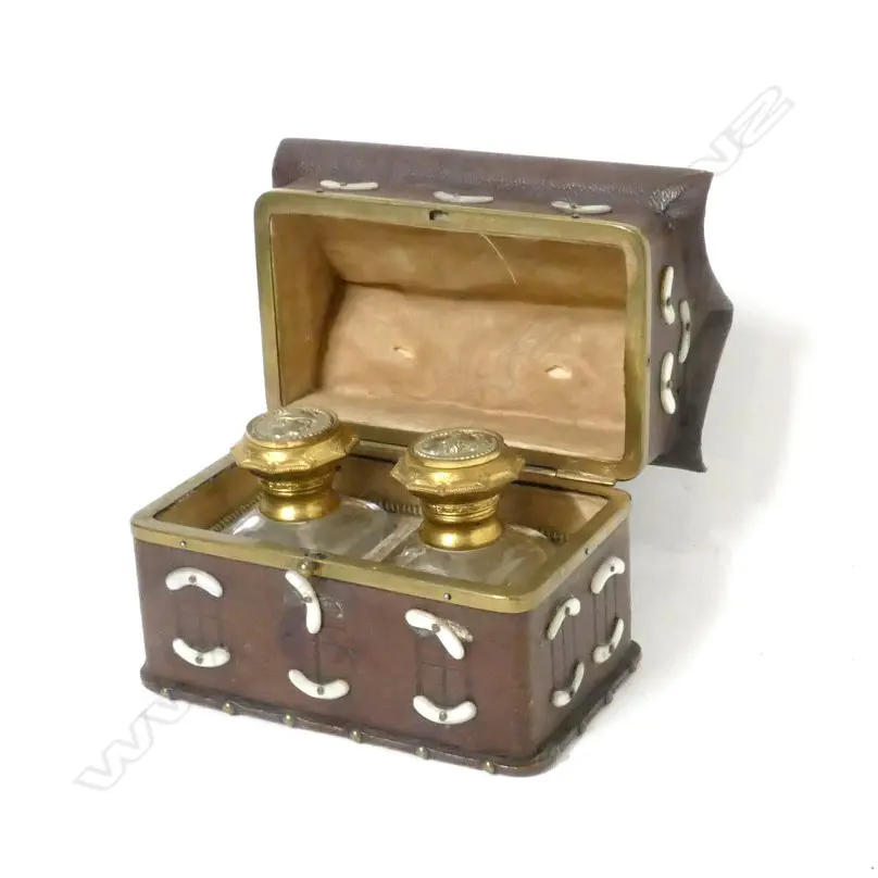A Victorian leather and brass scent bottle holder in the form of a Chinese house Image 1++