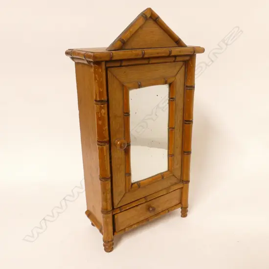 An Edwardian miniature wardrobe