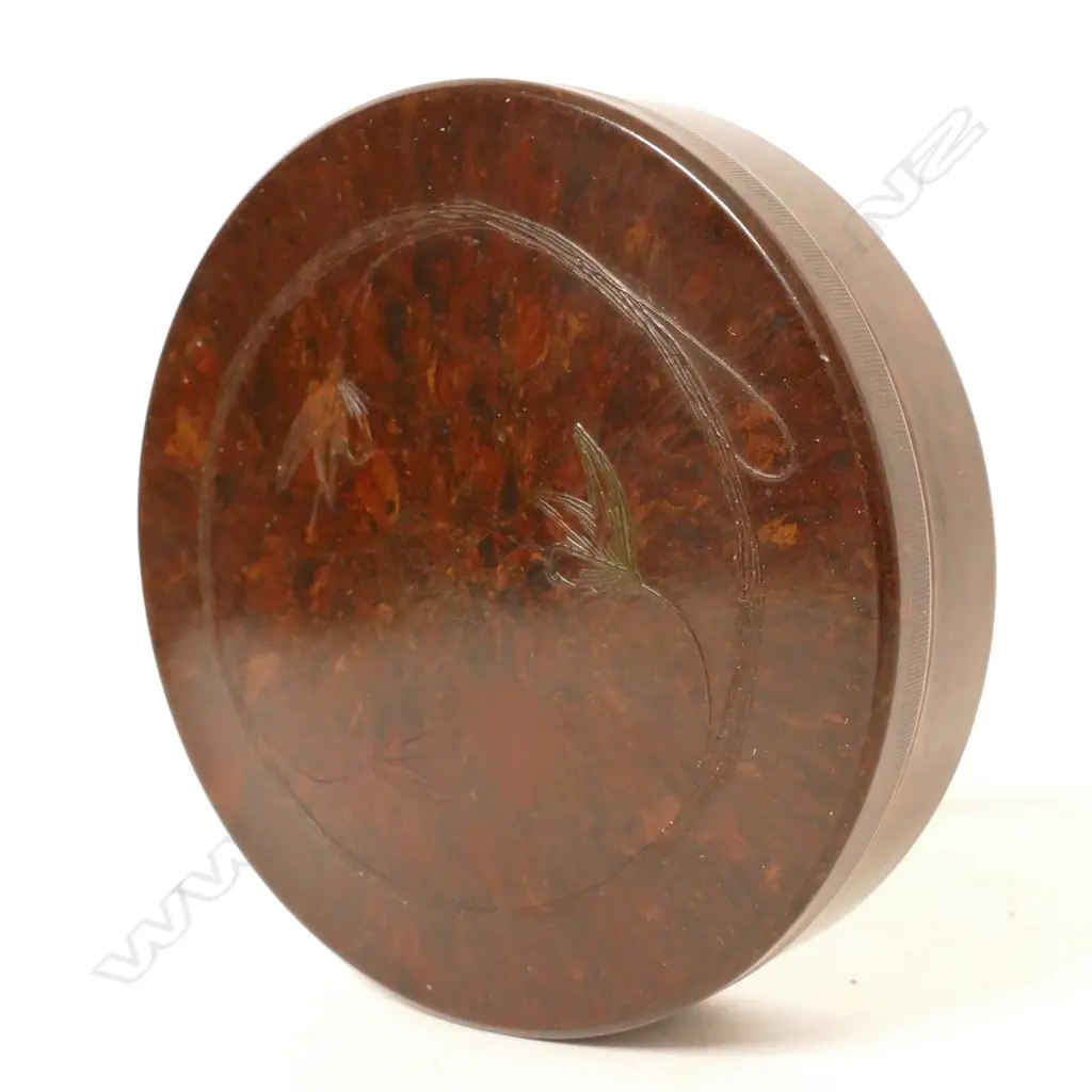 A Hardy's circular Bakelite screw top cast box Image 1++