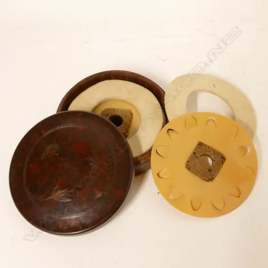 A Hardy's circular Bakelite screw top cast box