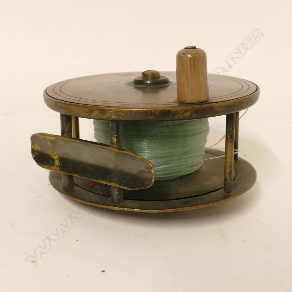 A 4" x 1¾" plate wind brass salmon reel for A.W. McCarthy Image 1++