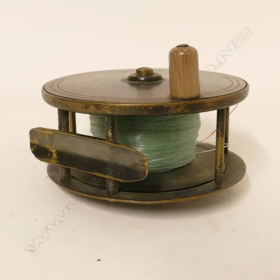 A 4" x 1¾" plate wind brass salmon reel for A.W. McCarthy