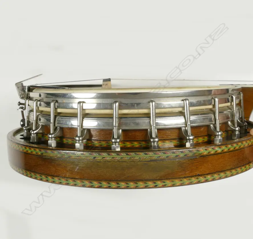 A c.1920-30s Slingerlands Nite Hawk four-string banjo Image 1++
