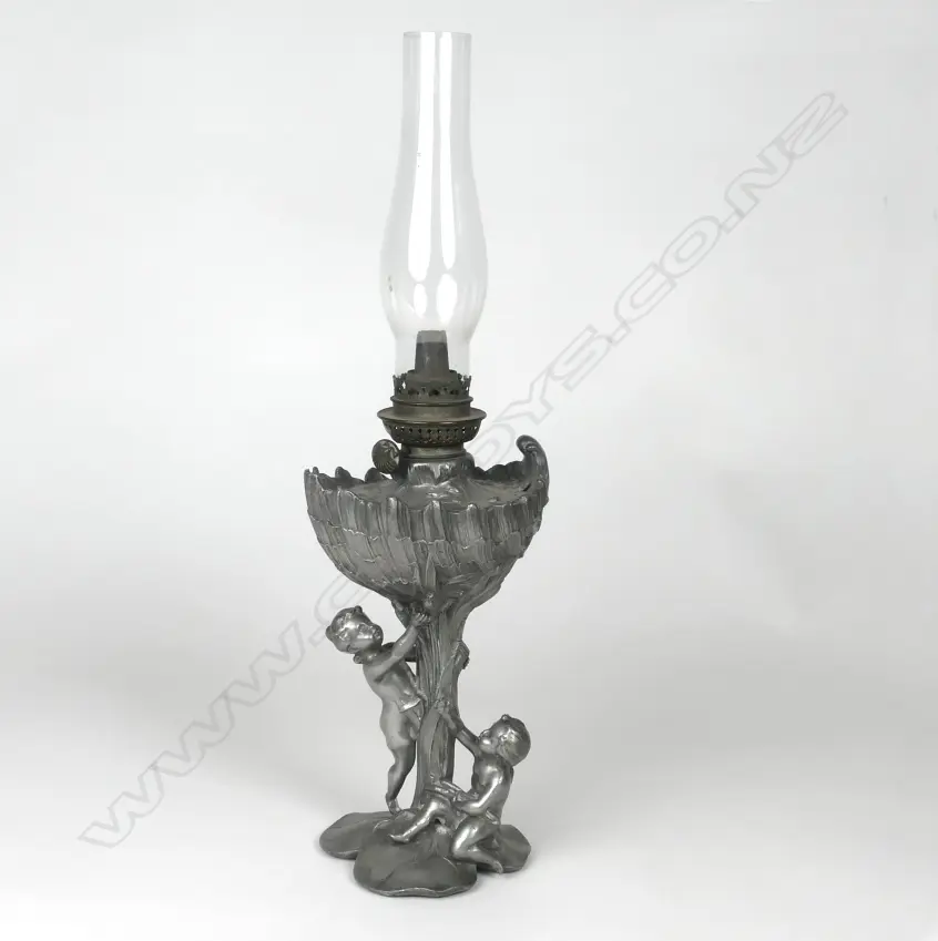 A small unusual late Victorian Art Nouveau pewter Victorian kerosene lamp Image 1++