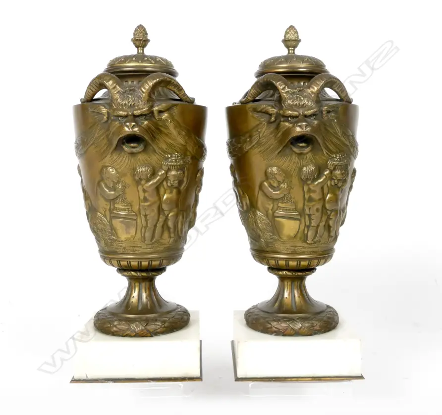 A pair of French 19thC bronze covered urns Image 1++