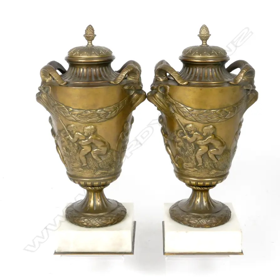 A pair of French 19thC bronze covered urns Image 1++