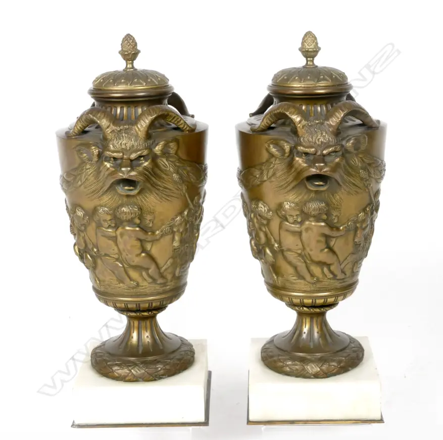 A pair of French 19thC bronze covered urns Image 1++