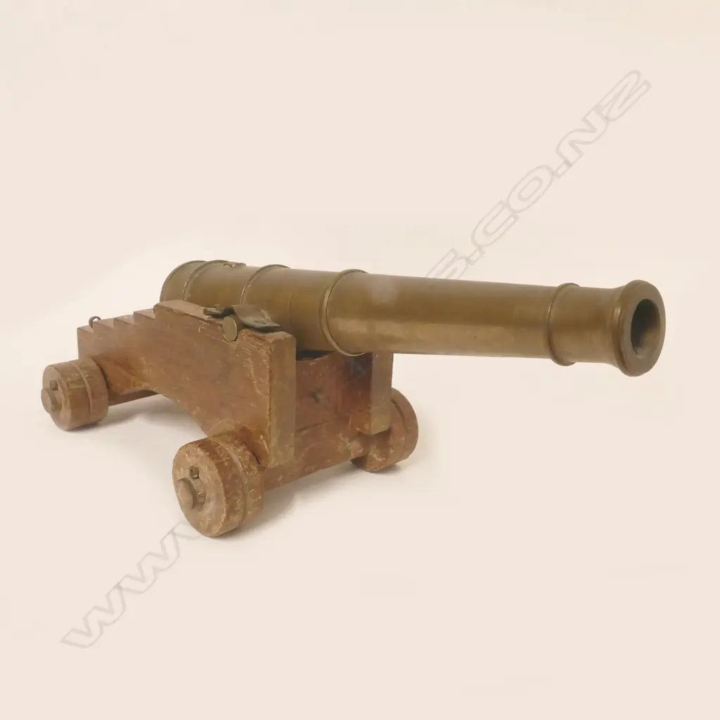 A bronze miniature canon model Image 1++