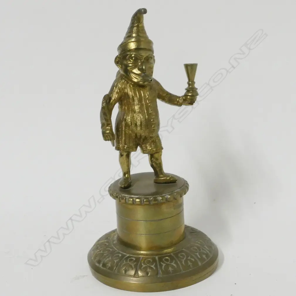 An early 1900s brass Mr. Punch cigar lighter Image 1++
