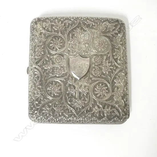 A silver (unmarked) cigarette case with the coat of arms of the Royal Inniskilling Fusiliers