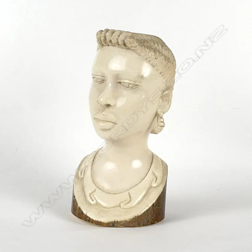 A carved ivory head Image 1++