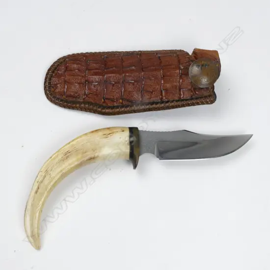 A hunting knife and scabbard
