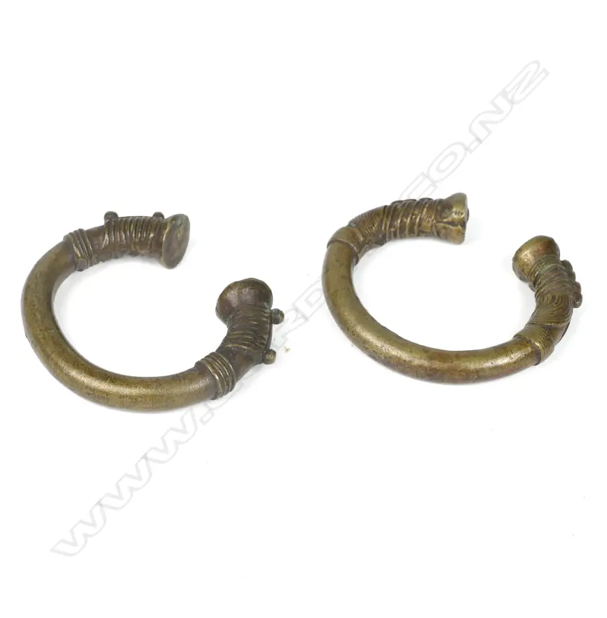 A pair of North African brass cuff bangles Image 1++