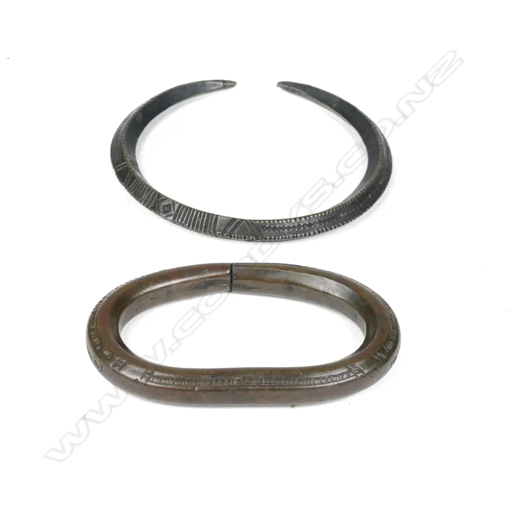 A North African brass bangle together with a brass slave cuff Image 1++