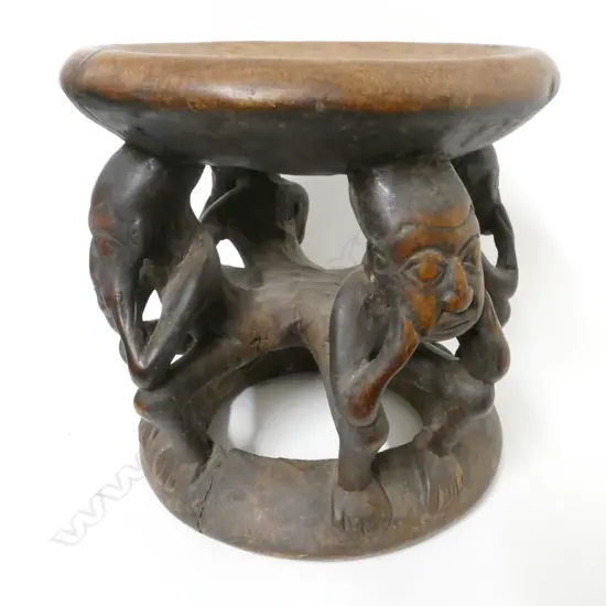 A Kaba carved figure stool from the Congo