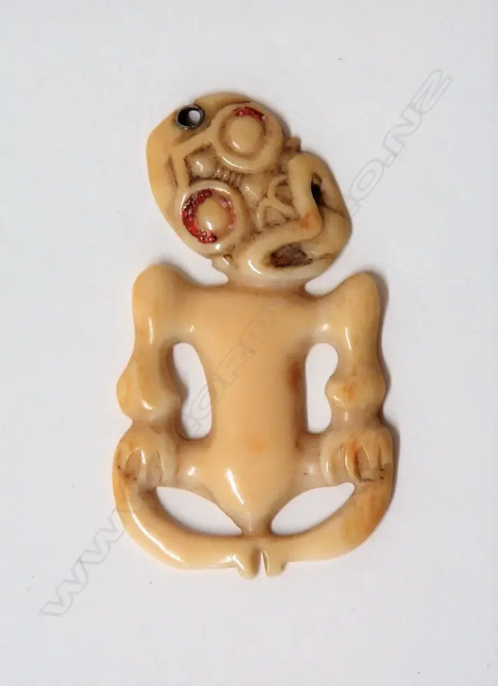 An old Maori marine ivory hei tiki Image 1++