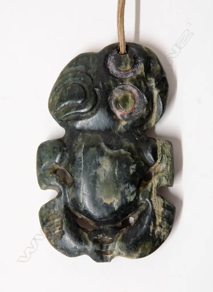 An early/mid 20thC Maori greenstone double sided hei tiki Image 1++