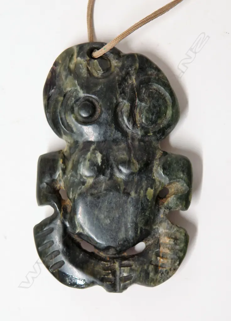 An early/mid 20thC Maori greenstone double sided hei tiki Image 1++