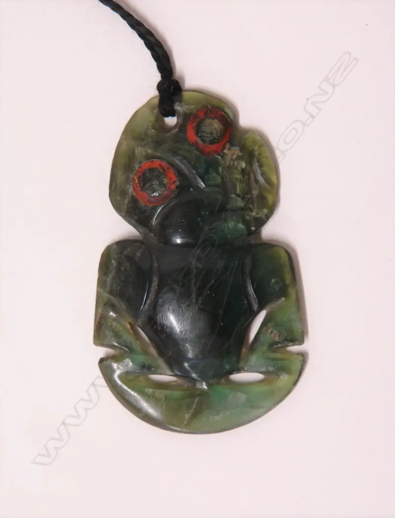 An old Maori pounamu hei tiki Image 1++