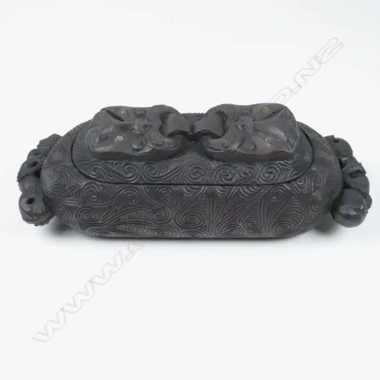 A Maori folk art waka huia