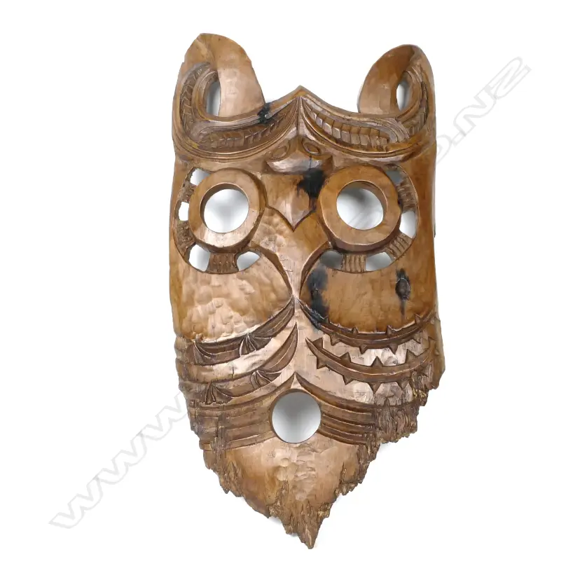 A Maori mask carved from a slab of matai Image 1++
