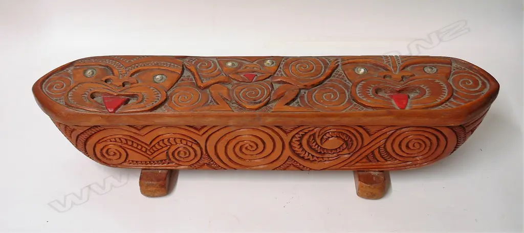 A 1947 Jane Brenkley carved and decorated waka huia Image 1++