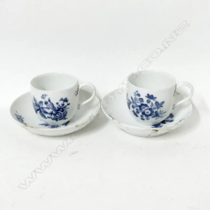 A pair of 18thC Meissen cups and saucers Image 1++