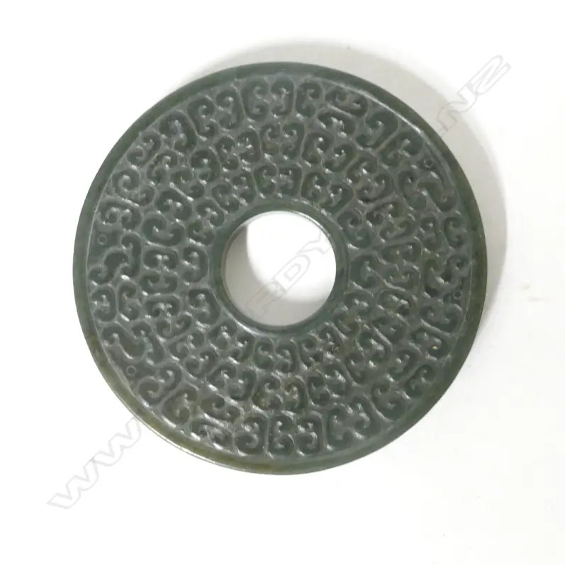 A Chinese dark green jade bi disc Image 1++