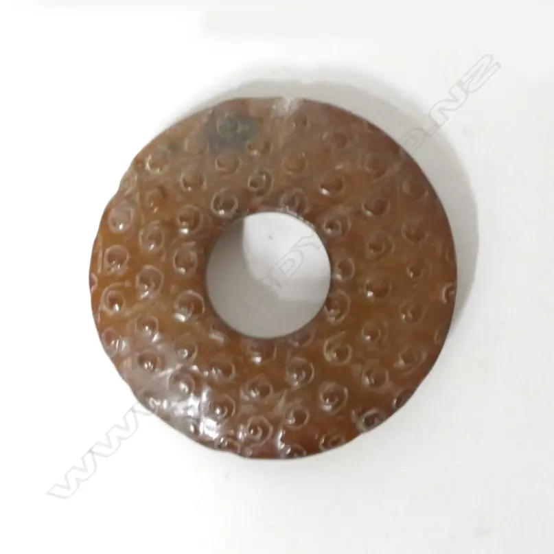 A Chinese brown jade bi disc Image 1++