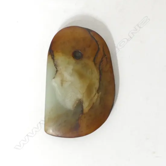 A Chinese jade blade shaped tool