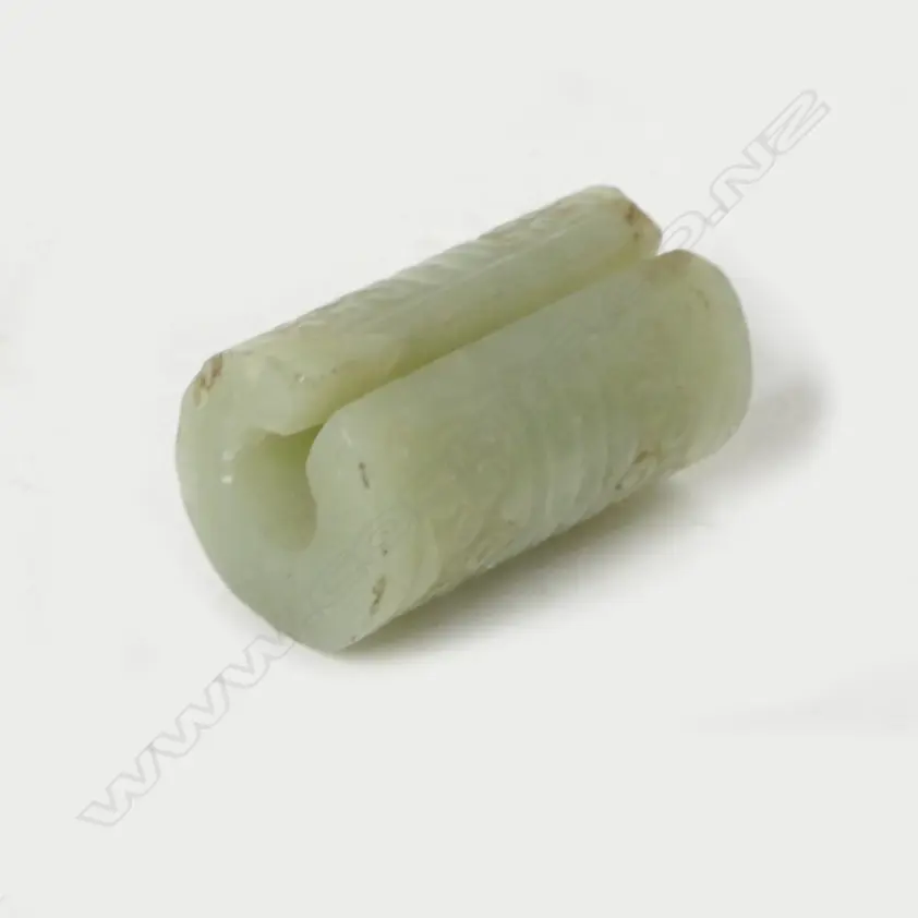 A Chinese pale green jade cylindrical bead Image 1++