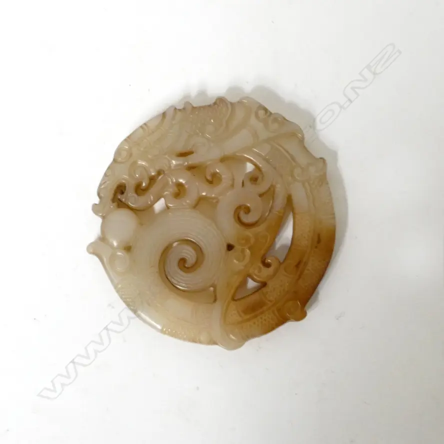 A Chinese pale jade circular disc Image 1++