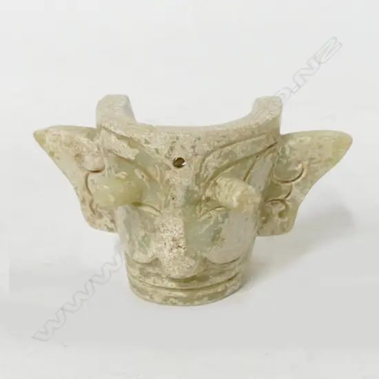 A Chinese archaic style jade taotie mask