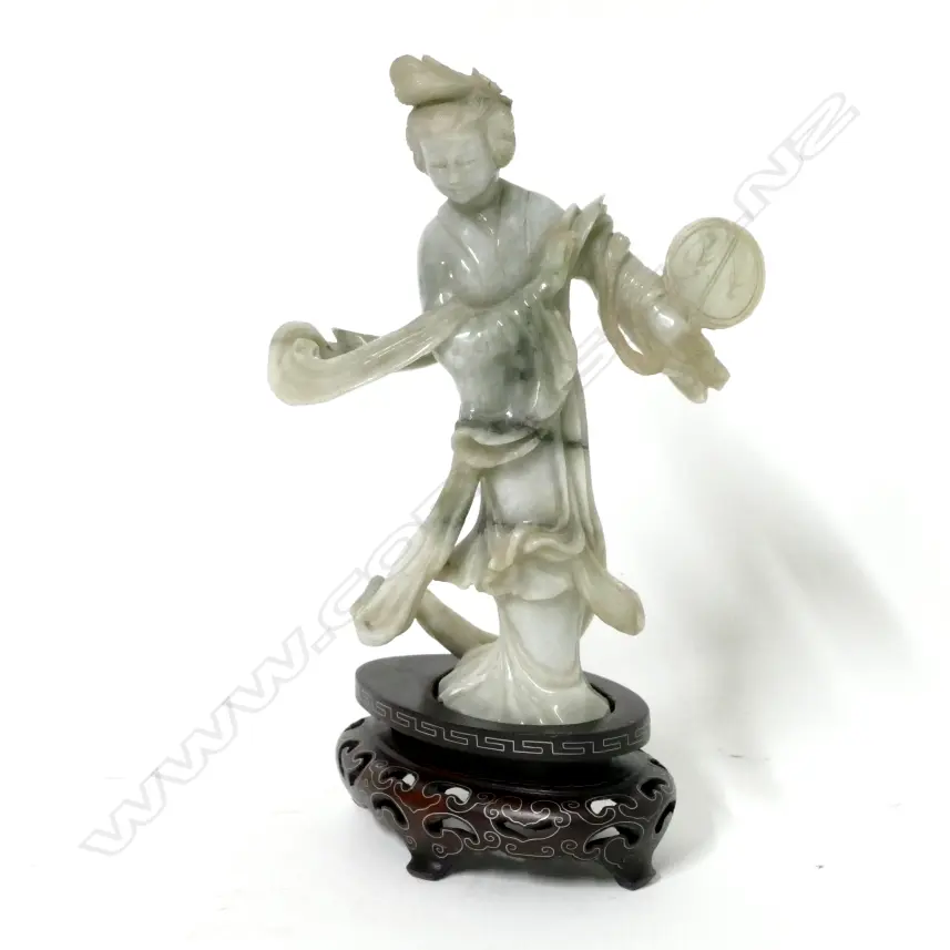 A Chinese carved jade figure of a woman Image 1++