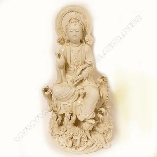 A large blanc-de-chine figure of Kuanyin